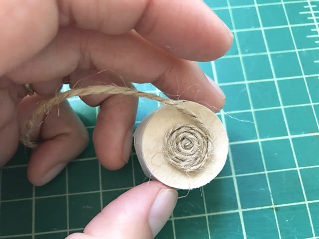 twine glued at the base in a spiral pattern to cover the base