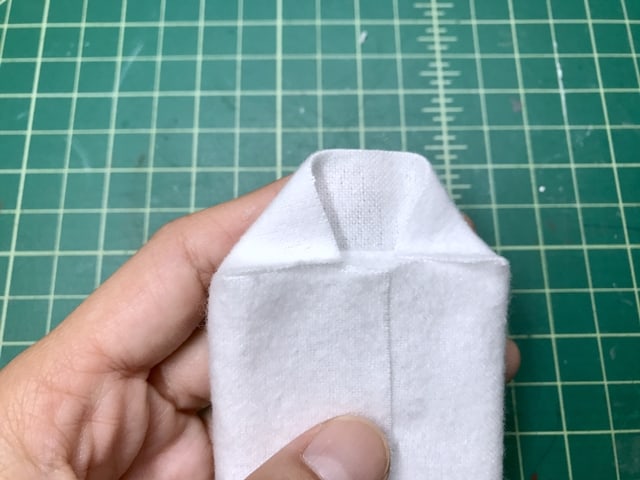 fabric flap is folded in the corners
