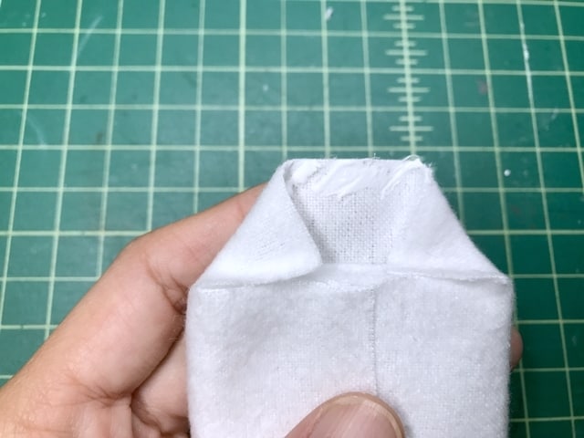 glue is placed on the edge of the fabric