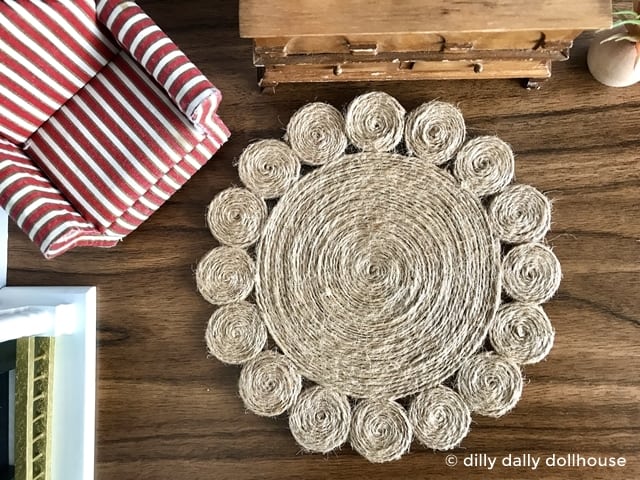 miniature dollhouse rug in a living room scene