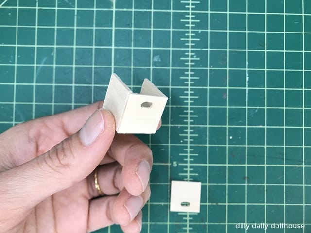 miniature box front is glued on