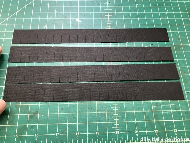 strips of cardstock to make dollhouse roof