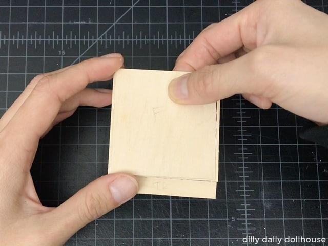 attach the front of the kitchen cabinet