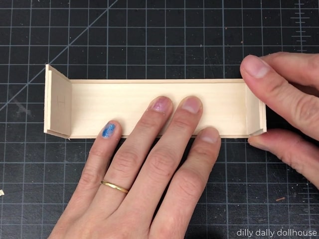 sides put on miniature credenza to make the body